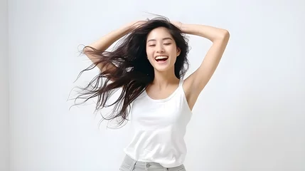 Poster People emotions, lifestyle leisure and beauty concept. upbeat happy and cheerful asian girl dancing and having fun, isolated on white wall  © Muzikitooo