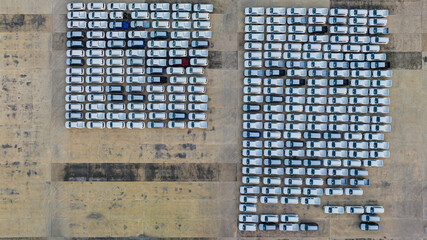 Aerial view new cars parking for sale stock lot row, New cars dealer inventory import export business commercial global, Business automobile and automotive industry.