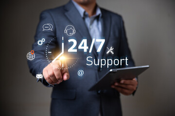 customer services and consulting concept, Businessman holding icon virtual 24/7 support services, Full-time available service.