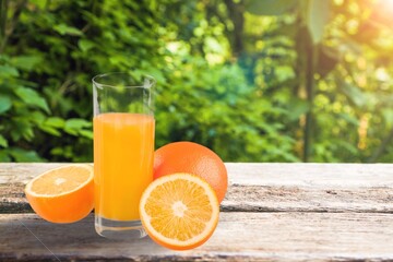 Orange juice with ripe  fresh orange fruits