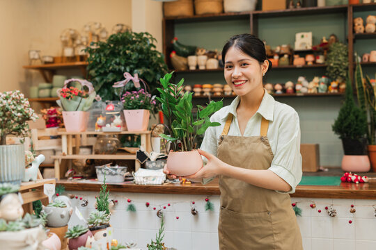 Portrait of Asian woman working in a plant shop