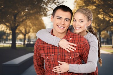 Young happy lovely couple having fun in the city.
