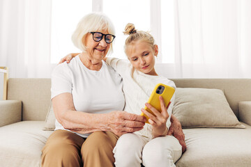 Child selfie family phone hugging bonding grandmother