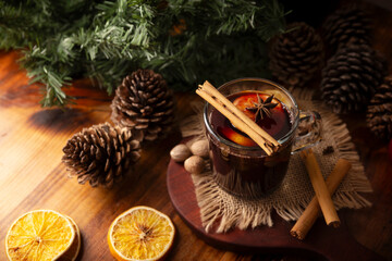 Spiced wine or Christmas mulled wine with orange, cinnamon, star anise, clove, nutmeg and other...