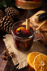 Spiced wine or Christmas mulled wine with orange, cinnamon, star anise, clove, nutmeg and other...