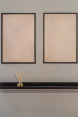 Minimalist home decoration of two blank frames on a wall