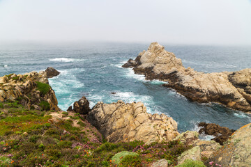 Fototapeta na wymiar Rocks in the ocean. CA, USA