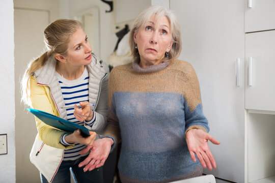 Surprised Elderly Woman Cannot Answer Questions Of The Interviewer At Home