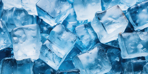 Vibrant blue ice cubes stand out against a backdrop of soft grey