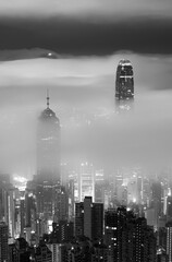 Night scenery of skyline of Hong Kong city in fog - 688428405