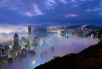 Fototapeta premium Night scenery of skyline of Hong Kong city in fog