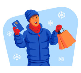 Man in a winter jacket with winter hat and scarf holding shopping bags and credit card
