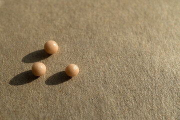 Fototapeta na wymiar Homeopathic balls on the surface.