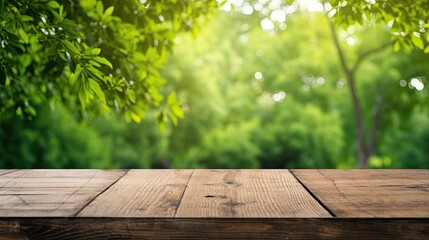 Naklejka na ściany i meble Empty old wooden table with green nature background