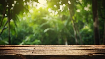 Empty old wooden table with green nature background