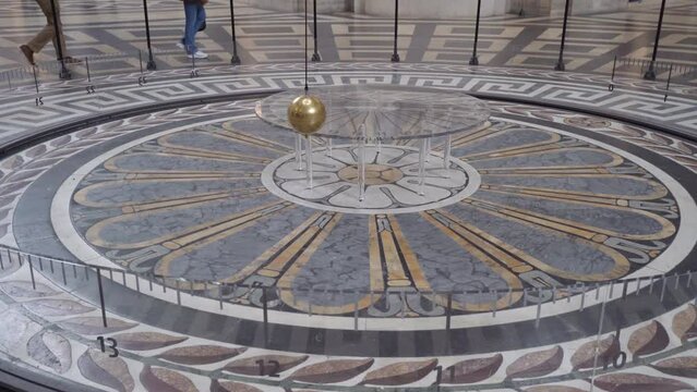 View of the Famous Foucault Pendulum Copper Ball Swinging Inside the Pantheon in Paris