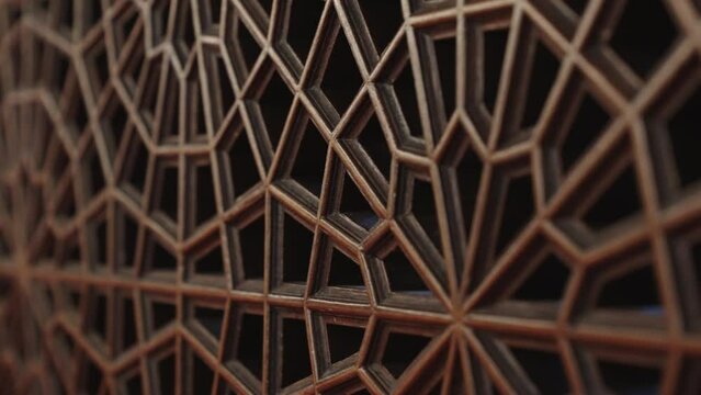 It is the pulpit part of the wooden mosque. It is a detailed image of wood and geometric patterns.