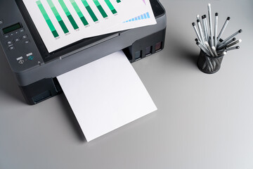 Close up of modern printer in the office