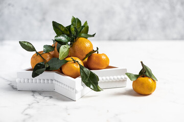 tangerines with leaves, oranges, citrus fruits