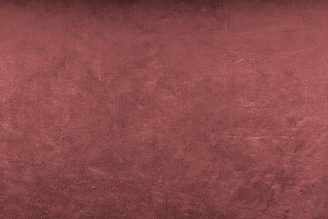 Fototapeta premium Burgundy abstract background. The burgundy-Colored Texture of a Plastered Wall with space to copy.