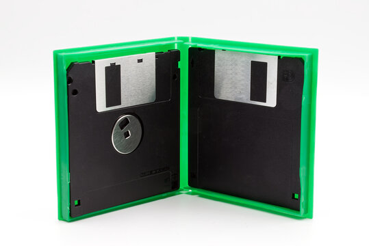 Floppy disk of 1.4 megabytes isolated on white background. Vintage storage for computer inside a box