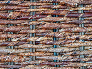 Detail of a wicker weave room divider