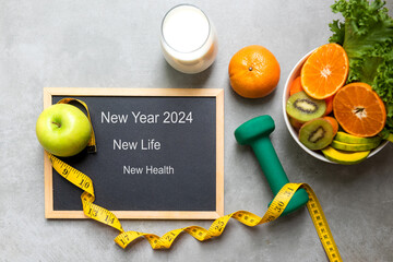 New Year for New Changes Healthy 2024.  Fresh vegetable fruits and healthy food for sport equipment...