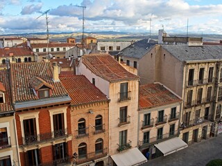 Fototapeta na wymiar To the north of Madrid sits the rustic city of Ávila. Medieval walls surround the preserved 16th-century town.