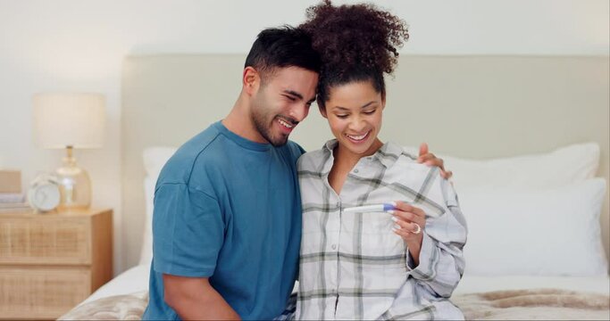 Happy couple, bed and hug with pregnancy test in support, love or care together for maternity at home. Excited man and woman smile for pregnant exam, positive results or family in bedroom at house