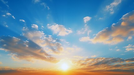 Fototapeta premium Sunrise within the sky and clouds with blue sky