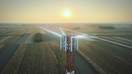 Futuristic 5G telecommunications transmission tower, AI technology IoT concept
