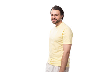 Fototapeta premium portrait of a handsome young caucasian man with black hair, beard and mustache dressed in a t-shirt