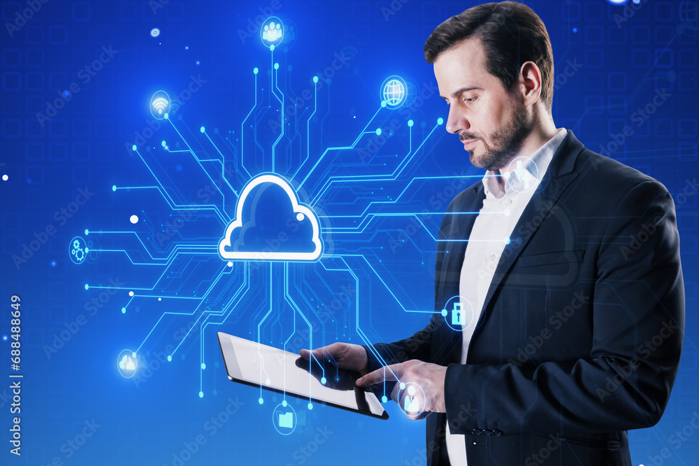 Poster attractive young european businessman using tablet with creative digital circuit cloud on blue backg