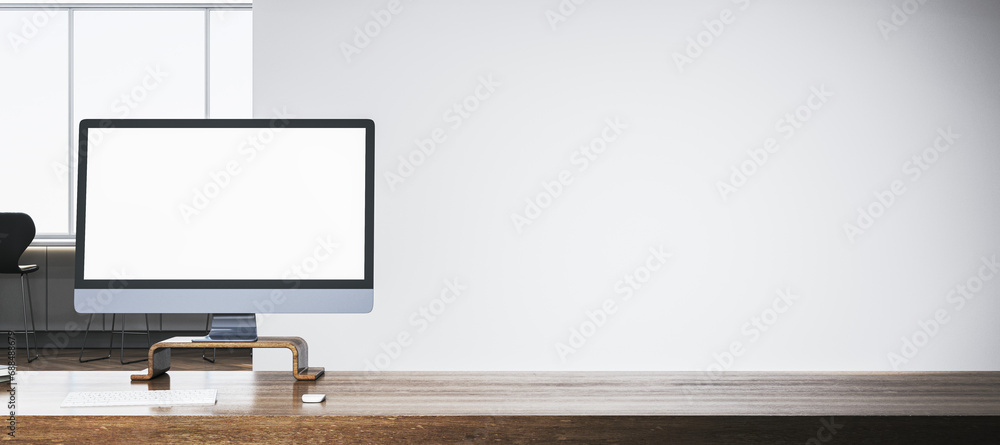 Poster Close up of empty white computer monitor on wide wooden office desk. Window with city view and stools in the background. Mock up, 3D Rendering.