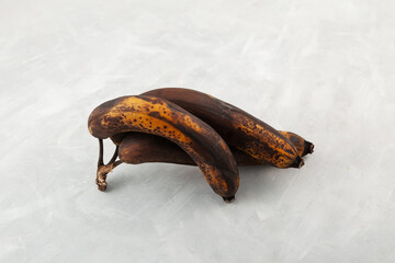 Brown fermented bananas for baking vegan banana bread. Rotten expired fruits. Zero waste concept....