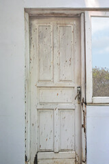 Old white wooden door