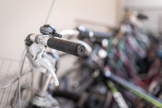 The classic style bike or bicycle vehicle, close-up at the handlebar part. Transportation vehicle object photo, selective focus.