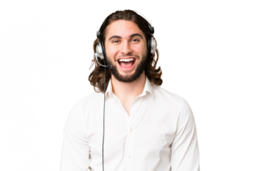 Telemarketer man working with a headset over isolated chroma key background with surprise facial expression