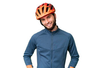 Young cyclist man over isolated chroma key background laughing - obrazy, fototapety, plakaty