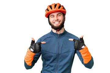 Young cyclist man over isolated chroma key background proud and self-satisfied