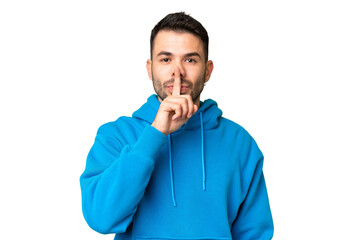 Young handsome caucasian man over isolated chroma key background showing a sign of silence gesture putting finger in mouth