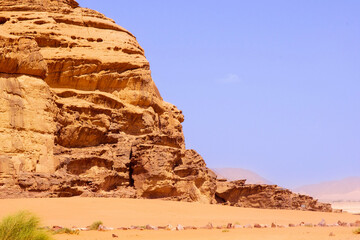 Jordan, Wadi Rum desert. Incredible landscapes with vibrant colors on all sides. Martian city surrounded by incredible rocks and mountains of bizarre shapes with most unusual architecture.