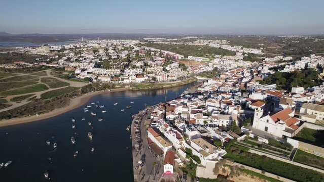 Aerial View Of Ferragudo, A Portuguese Civil Parish Beside Arade River. Parallax Shot