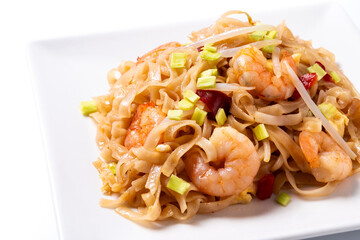 Pad Thai with shrimp and vegetables isolated on white background. traditional thai food