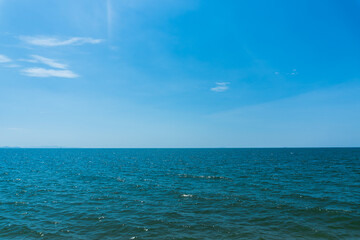 Bright blue sky with white clouds for background or wallpapers.The beauty of tropical nature, Chanthaburi province, Thailand, horizon, seascape, sea connect to the sky