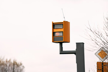 Yellow speedcamera traffic control.