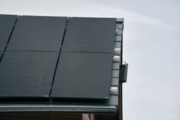 Sustainable Modern House with Solar Panels. A Beautiful Blend of Style and Renewable Energy. Sustainable home powered by solar panels.