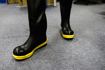 Photo of special pants and shoes for fishermen, these clothes are water resistant