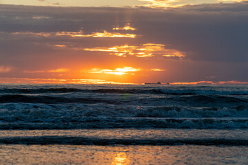 Beautiful sunset on the beach in Zandvoort, Netherlands	
