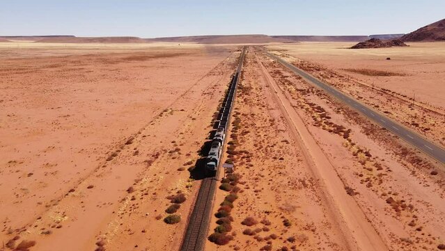 Namibian Desert Train Ride: 4K Footage of Isolated Tracks in Vast Wilderness of the Namib Desert. No  trace of civilisation to be seen.